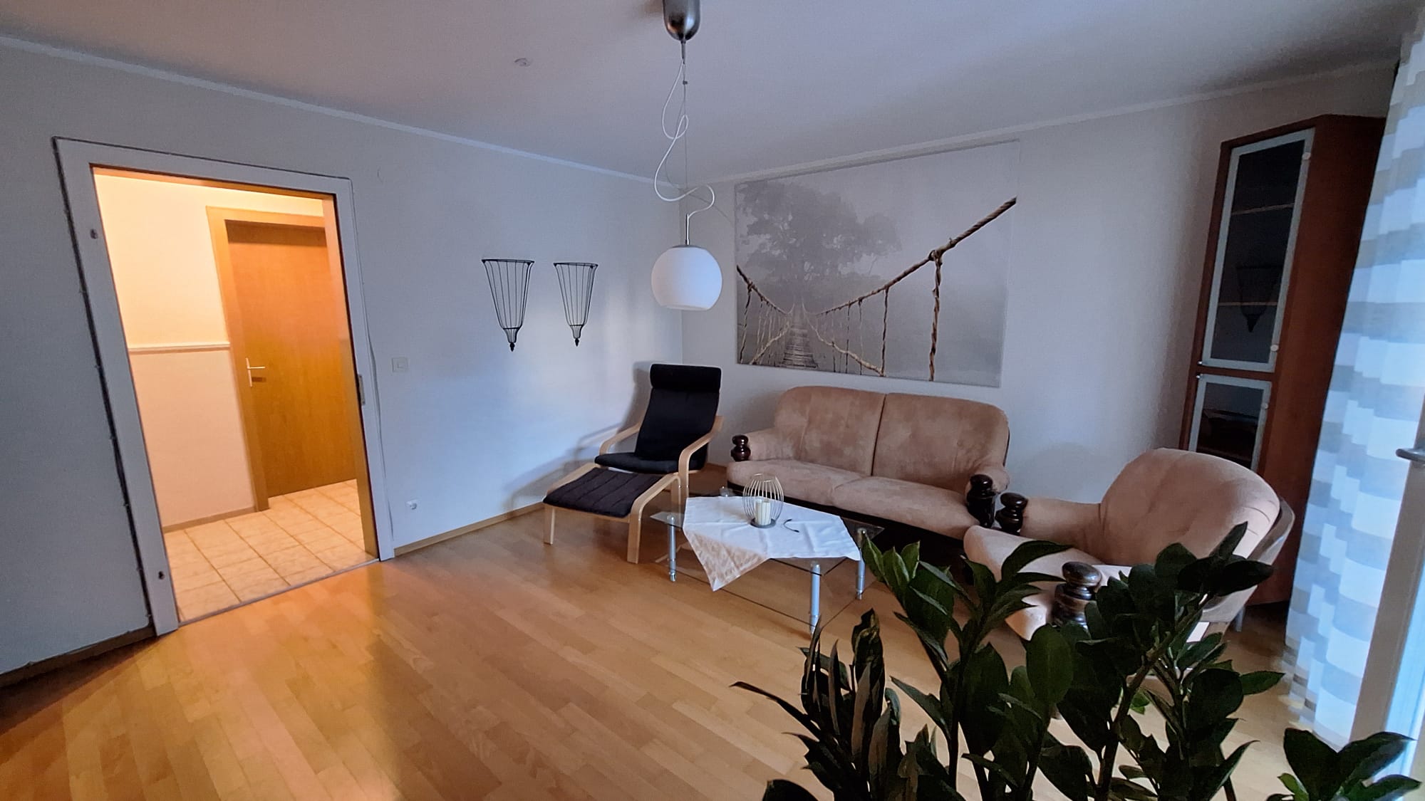 Wohnbereich mit Sofa und Sesseln